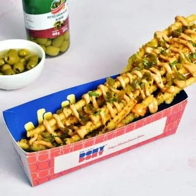 Loaded toro fries with jalapeno and chipotle drizzle